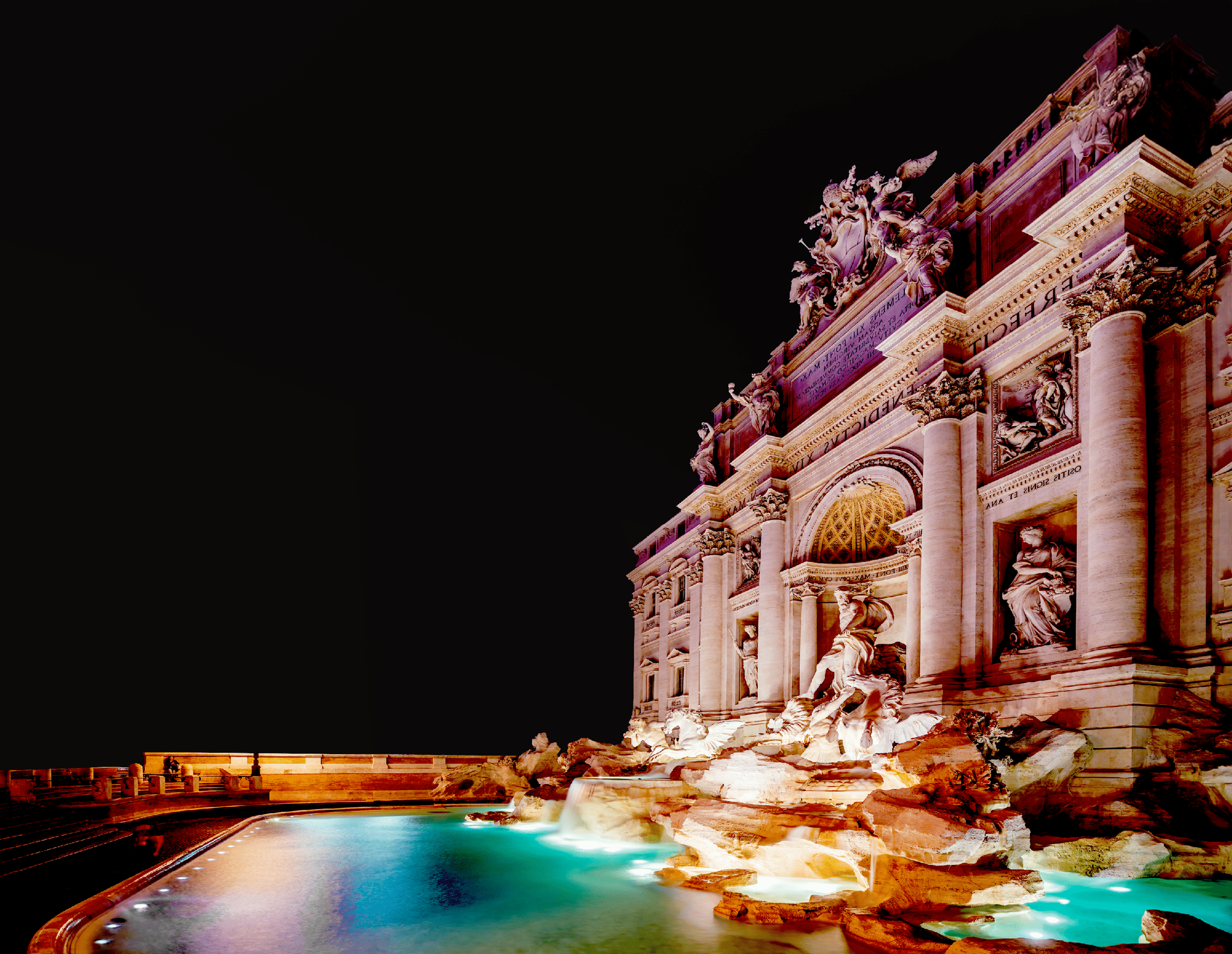 Trevi Fountain illuminated at night in the heart of Roma, Italy